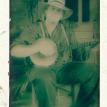 Greg Hooven with Straw hat and banjo
